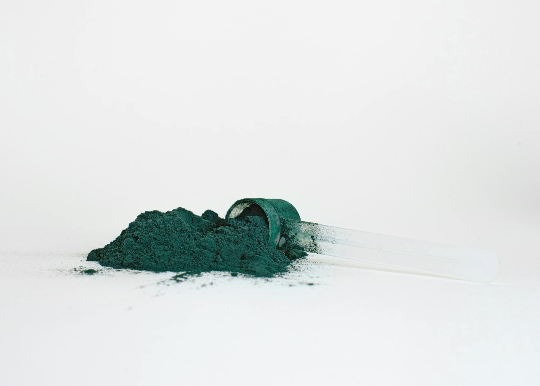 powdered green paint in a studio